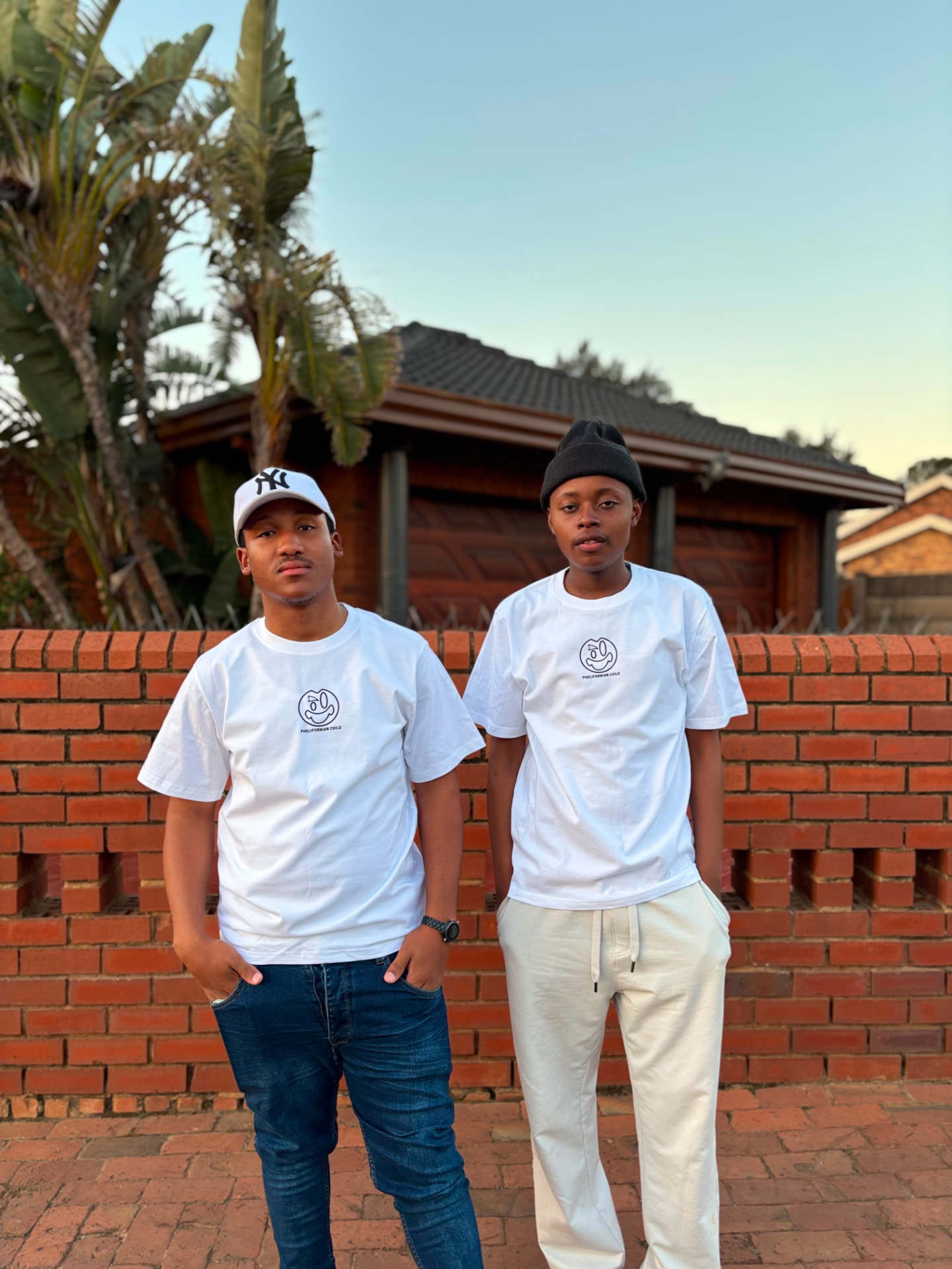 DLS Store — two models wearing Phelifornian Child tees